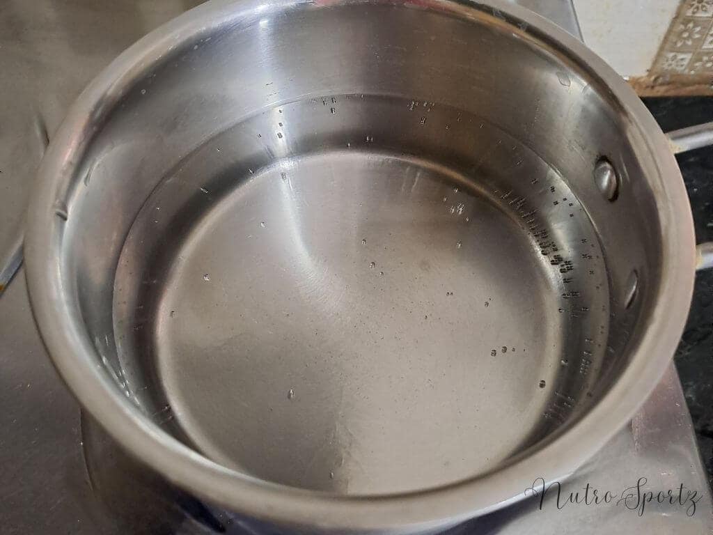 An image of water boiling in a pan.