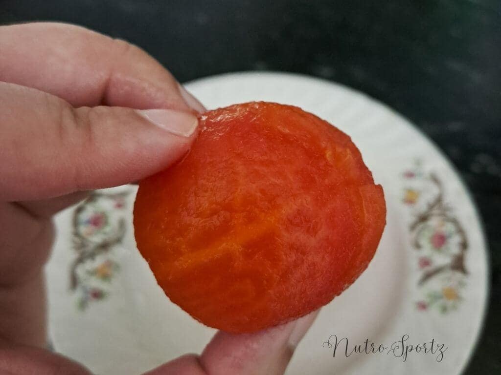 An image of a blanched tomato without a peel.