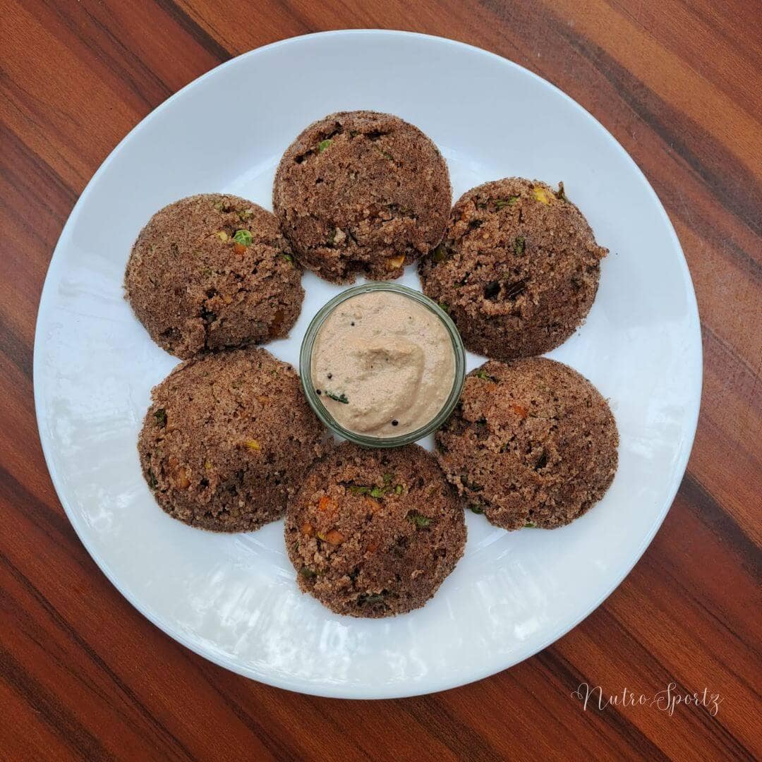 An image of instant ragi idli with peanut chutney.