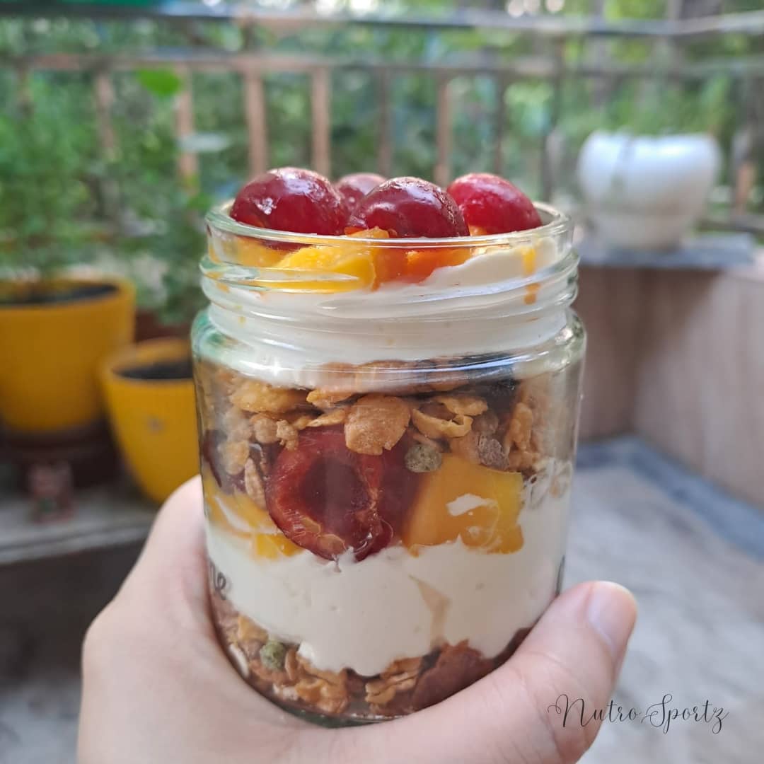 An image of yogurt parfait in a jar