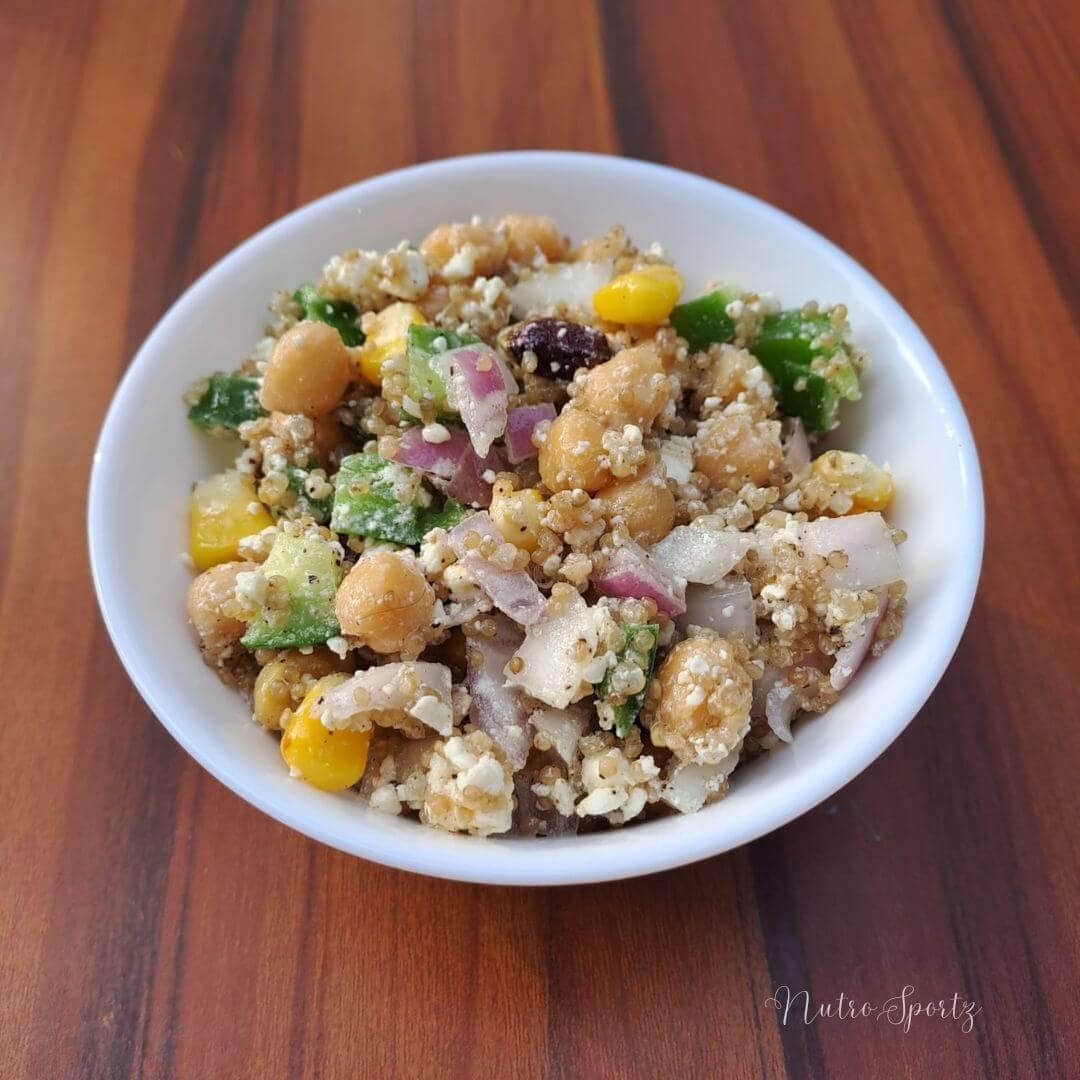An image of quinoa chickpea salad in a bowl.