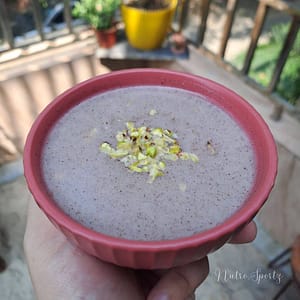 An image of ragi malt/ ragi porridge in a bowl.