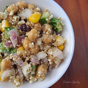 An image of quinoa chickpea salad in a bowl.