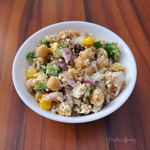 An image of quinoa chickpea salad in a bowl.
